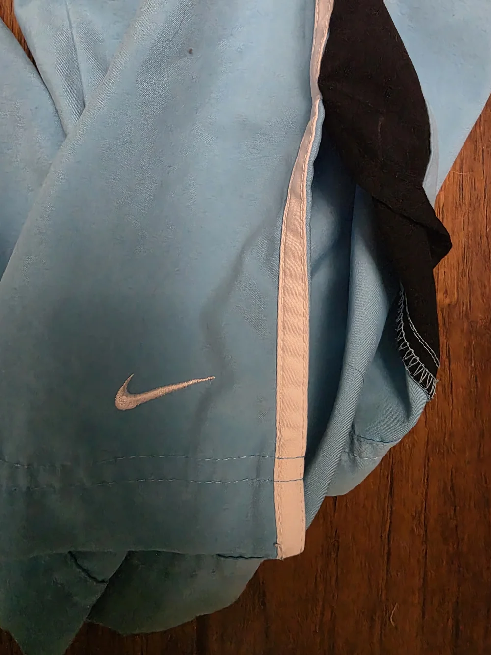 Nike Vintage Womens Sky Blue Track Pants with Black & White Side Stripes